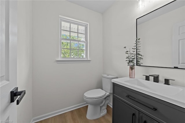 4908 Peppercorn Ln, Greensboro, NC 27406 - bathroom with vanity and wood finished floors