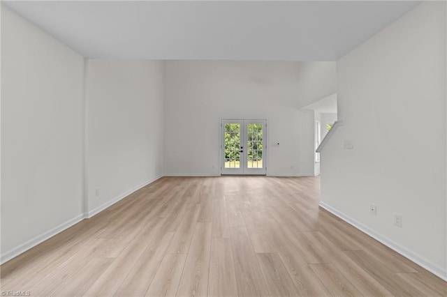 4908 Peppercorn Ln, Greensboro, NC 27406 - unfurnished room with light wood-type flooring and french doors