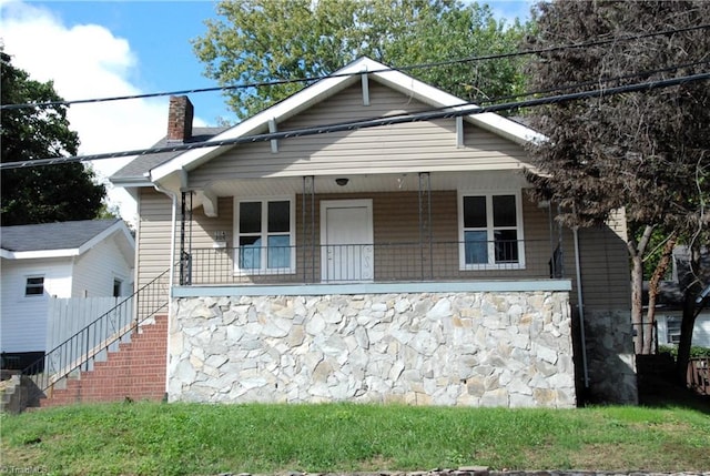 bungalow featuring covered porch