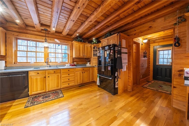 kitchen with black appliances, wooden ceiling, sink, beam ceiling, and pendant lighting