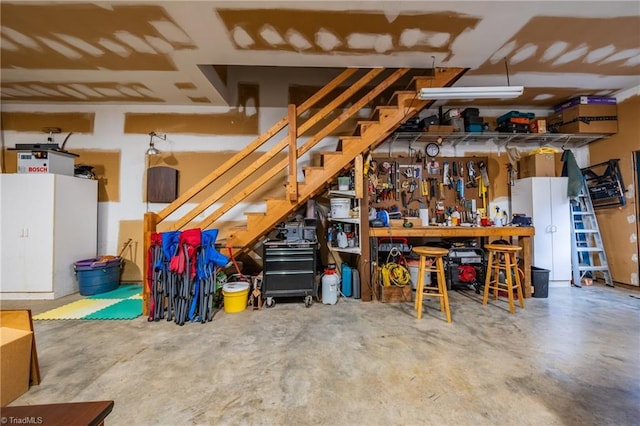 garage with a workshop area