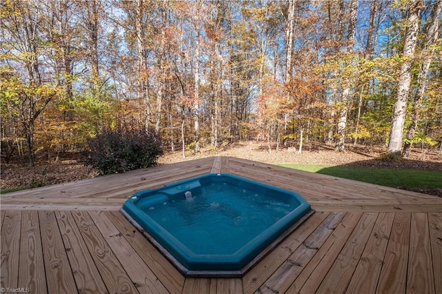 view of swimming pool featuring a wooden deck