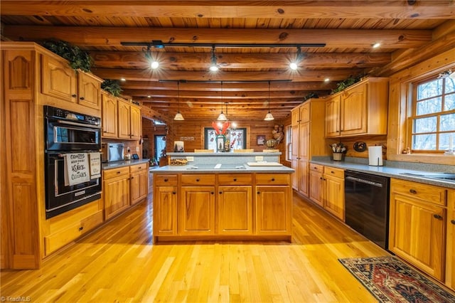 kitchen with decorative light fixtures, wood ceiling, and beamed ceiling