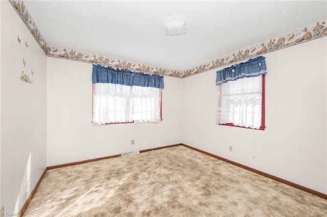 view of carpeted spare room