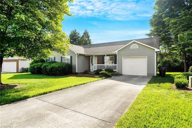 ranch-style home with a garage, a porch, a front lawn, and central AC unit