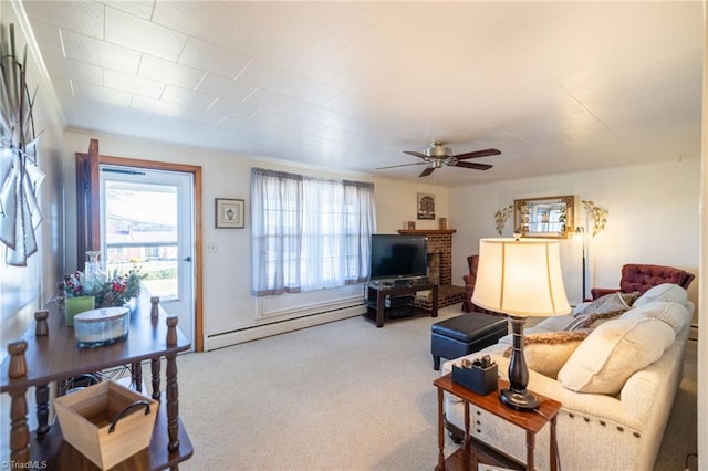 carpeted living area with a baseboard radiator, a baseboard heating unit, and a ceiling fan