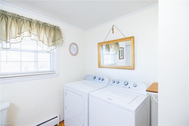 washroom featuring laundry area, independent washer and dryer, a baseboard radiator, and crown molding