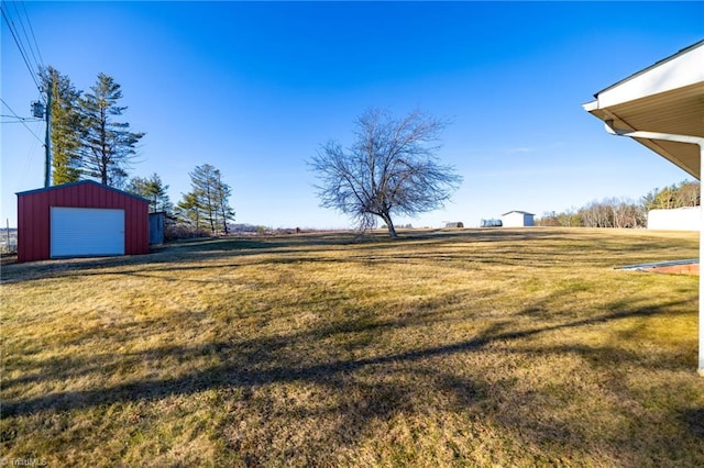 view of yard with a garage