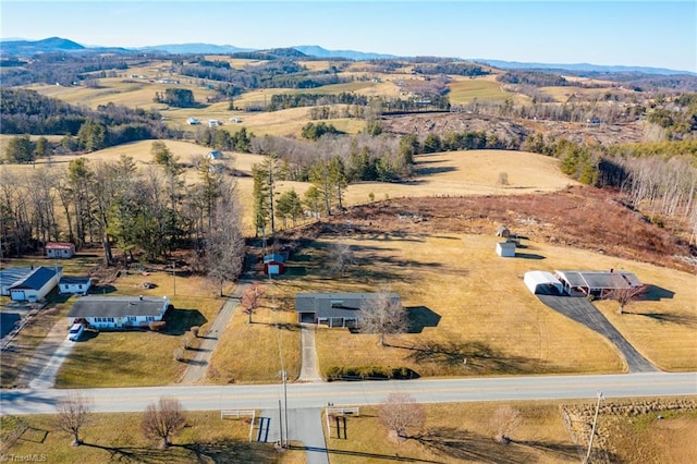 birds eye view of property featuring a rural view and a mountain view