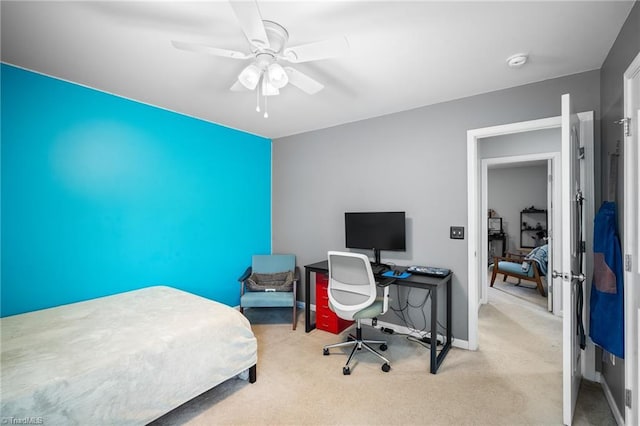 bedroom with baseboards, a ceiling fan, and carpet floors