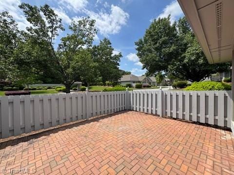 view of patio / terrace with fence