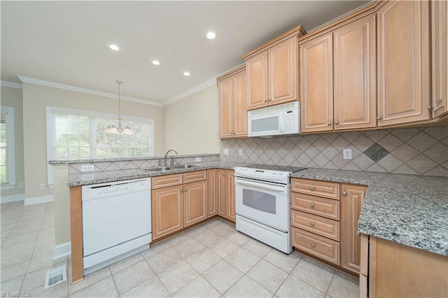 2334 Addison Blvd, High Point, NC 27262 - kitchen with white appliances, a sink, ornamental molding, a peninsula, and light tile patterned floors
