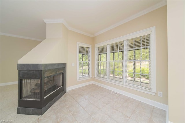 2334 Addison Blvd, High Point, NC 27262 - unfurnished living room featuring ornamental molding, baseboards, and a multi sided fireplace