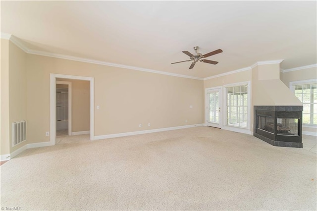 2334 Addison Blvd, High Point, NC 27262 - unfurnished living room featuring crown molding, baseboards, a ceiling fan, and carpet flooring