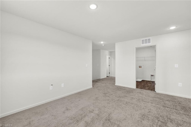 empty room featuring carpet floors