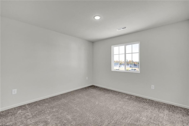 view of carpeted spare room