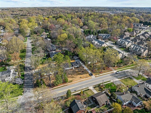 212 W Cornwallis Dr, Greensboro, NC 27408 - aerial overview of property's location with nearby suburban area
