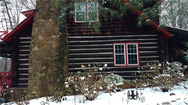 view of snow covered property