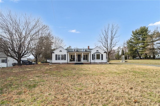 view of front of property featuring a porch and a front yard