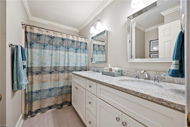 4919 Setter Ct, Jamestown, NC 27282 - full bath with double vanity, ornamental molding, wood finished floors, and a shower with shower curtain