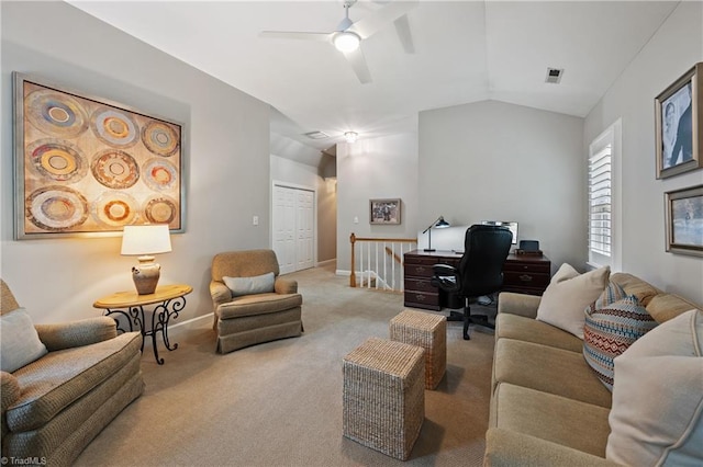 4919 Setter Ct, Jamestown, NC 27282 - carpeted living area featuring a ceiling fan, vaulted ceiling, baseboards, and a desk