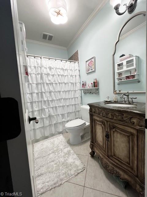 bathroom featuring toilet, crown molding, tile patterned flooring, a shower with shower curtain, and vanity