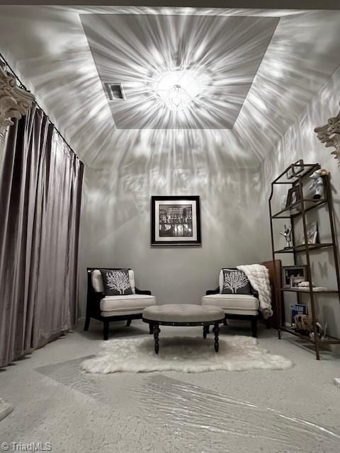 sitting room featuring carpet floors