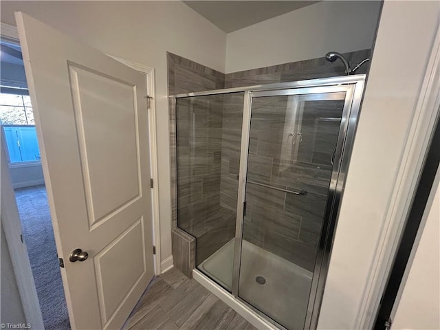 full bathroom with a stall shower