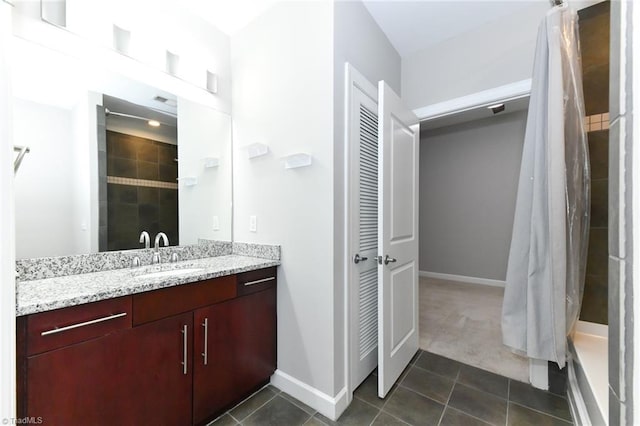 bathroom with vanity, tile patterned floors, and a shower with curtain