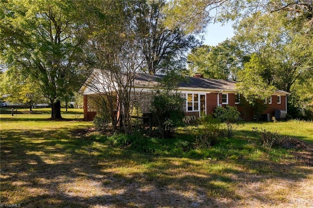 exterior space featuring a front lawn