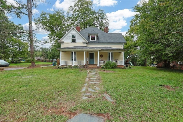 view of front of home with a front lawn and a porch