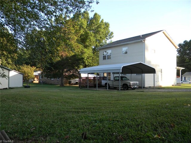 view of yard featuring a carport
