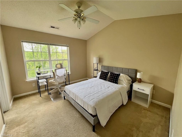 88 Tannenbaum Cir, Greensboro, NC 27410 - bedroom featuring light colored carpet, baseboards, lofted ceiling, and a ceiling fan