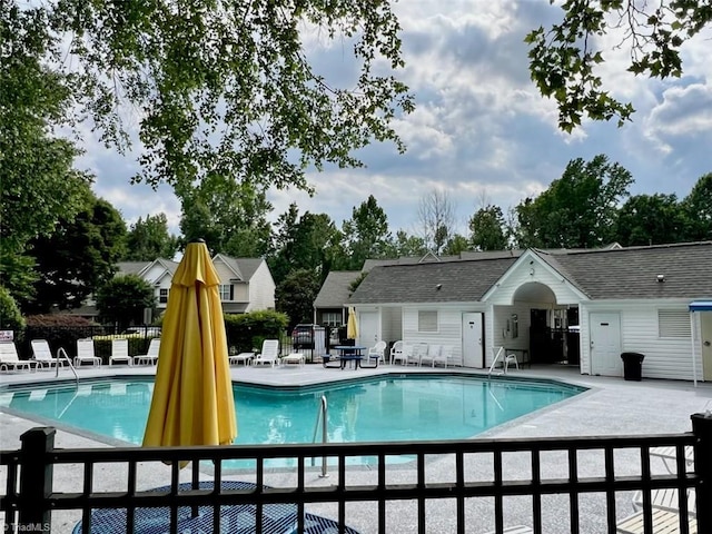 88 Tannenbaum Cir, Greensboro, NC 27410 - community pool with a patio and fence