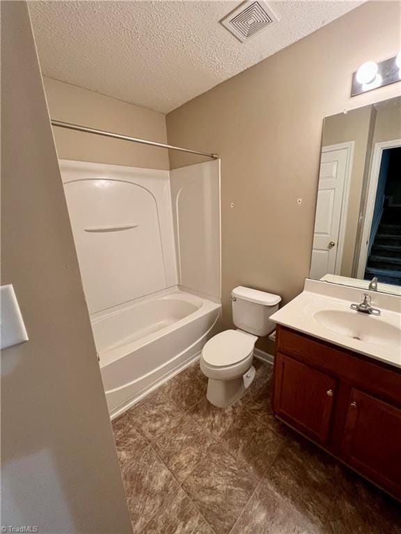 88 Tannenbaum Cir, Greensboro, NC 27410 - bathroom featuring a textured ceiling, vanity, toilet, and shower / washtub combination