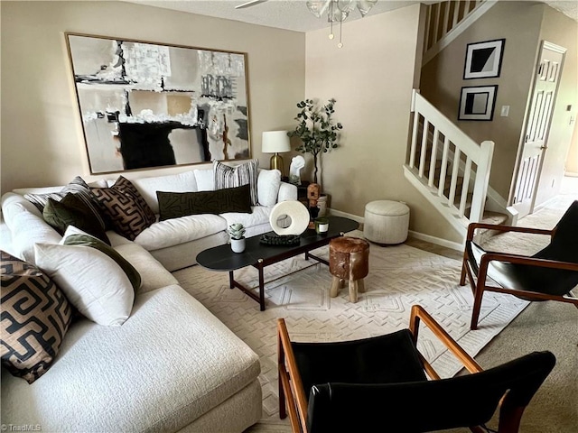 88 Tannenbaum Cir, Greensboro, NC 27410 - living room with stairway, baseboards, and ceiling fan