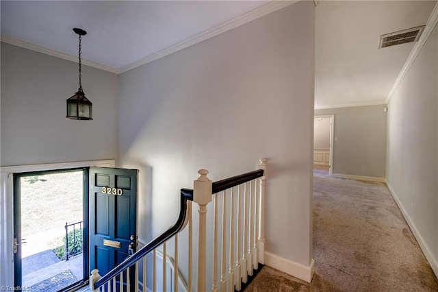 3230 Kinnamon Rd, Winston-Salem, NC 27104 - stairs featuring crown molding, carpet flooring, baseboards, and visible vents