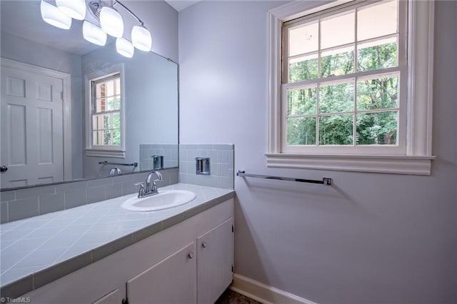 3230 Kinnamon Rd, Winston-Salem, NC 27104 - bathroom with vanity and baseboards