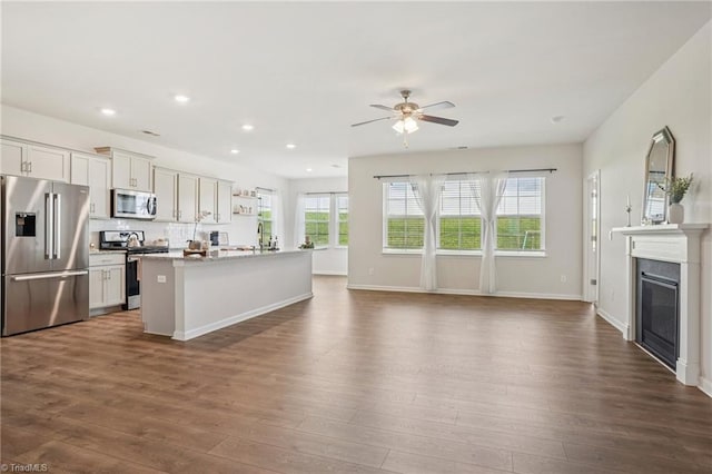 162 Bryson Blvd, Lexington, NC 27295 - kitchen featuring appliances with stainless steel finishes, ceiling fan, open floor plan, dark wood-style floors, and recessed lighting
