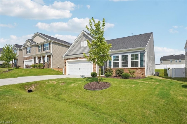 162 Bryson Blvd, Lexington, NC 27295 - view of front facade with driveway, brick siding, and a garage