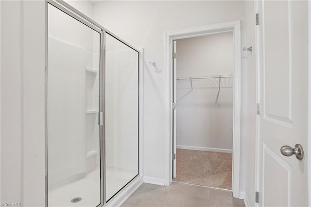 162 Bryson Blvd, Lexington, NC 27295 - bathroom with a stall shower and a walk in closet