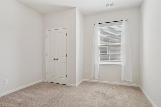 162 Bryson Blvd, Lexington, NC 27295 - unfurnished bedroom featuring carpet floors and a closet