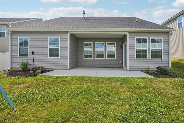 162 Bryson Blvd, Lexington, NC 27295 - rear view of house featuring a patio area and a lawn