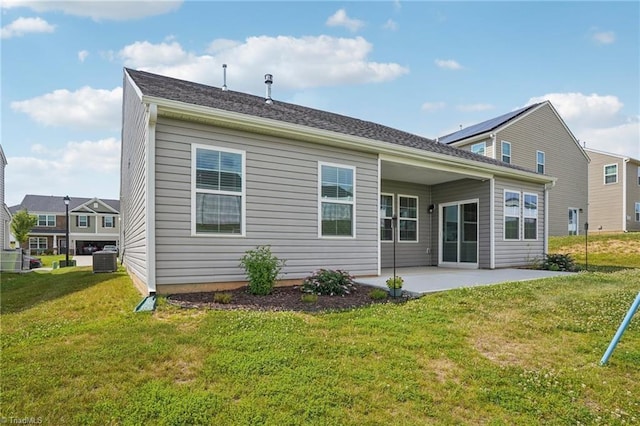 162 Bryson Blvd, Lexington, NC 27295 - rear view of house with a patio and a lawn