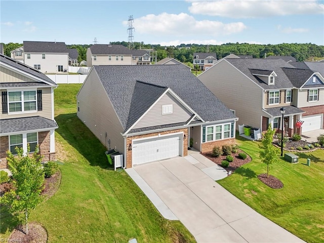 162 Bryson Blvd, Lexington, NC 27295 - view of front of property featuring a residential view, driveway, brick siding, and a garage
