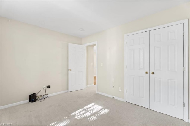 6051 Brookstone Ridge Dr, Winston-Salem, NC 27107 - unfurnished bedroom featuring carpet floors, baseboards, and a closet