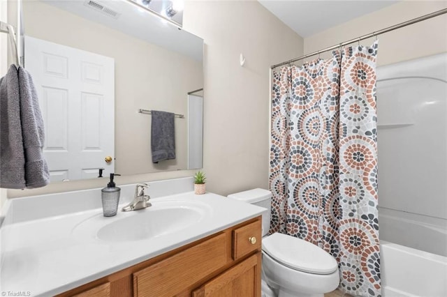 6051 Brookstone Ridge Dr, Winston-Salem, NC 27107 - full bathroom featuring toilet, vanity, and shower / bath combo with shower curtain