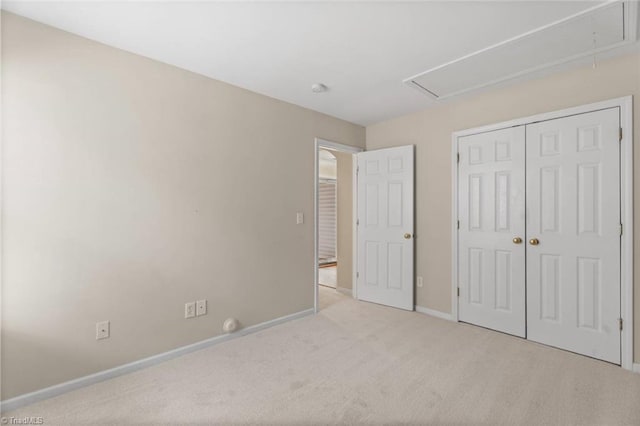 6051 Brookstone Ridge Dr, Winston-Salem, NC 27107 - unfurnished bedroom featuring carpet flooring, attic access, baseboards, and a closet