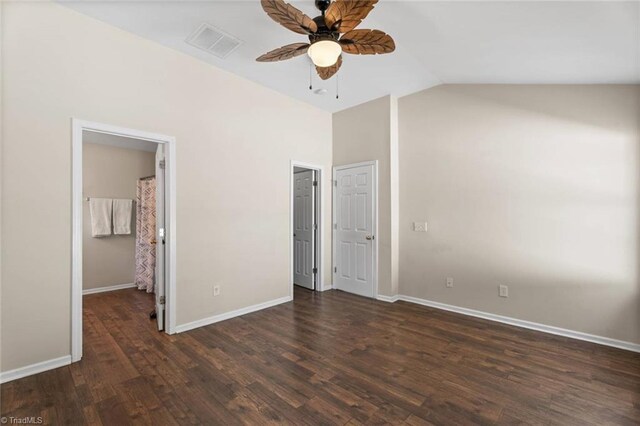 6051 Brookstone Ridge Dr, Winston-Salem, NC 27107 - unfurnished bedroom with vaulted ceiling, wood finished floors, baseboards, and a ceiling fan