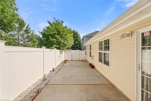 6051 Brookstone Ridge Dr, Winston-Salem, NC 27107 - fenced backyard featuring a patio area